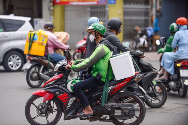 Bộ Công thương yêu cầu Grap minh bạch khi thu phụ phí nắng nóng